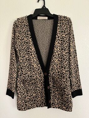 Reverse leopard sweater size small.